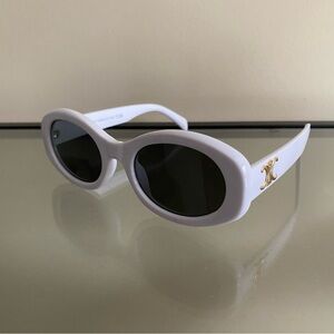 White Oval Sunglasses with Gold Emblem